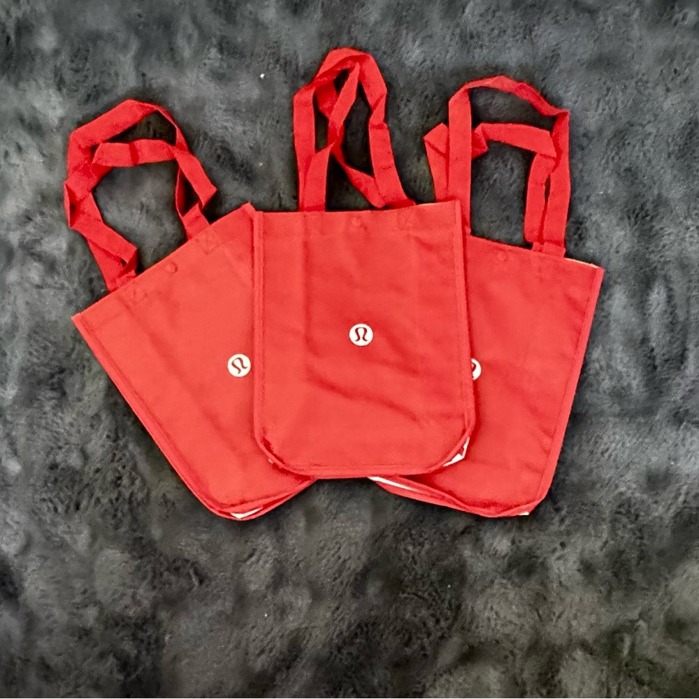Three brand new reusable Lululemon Red Tote Bags